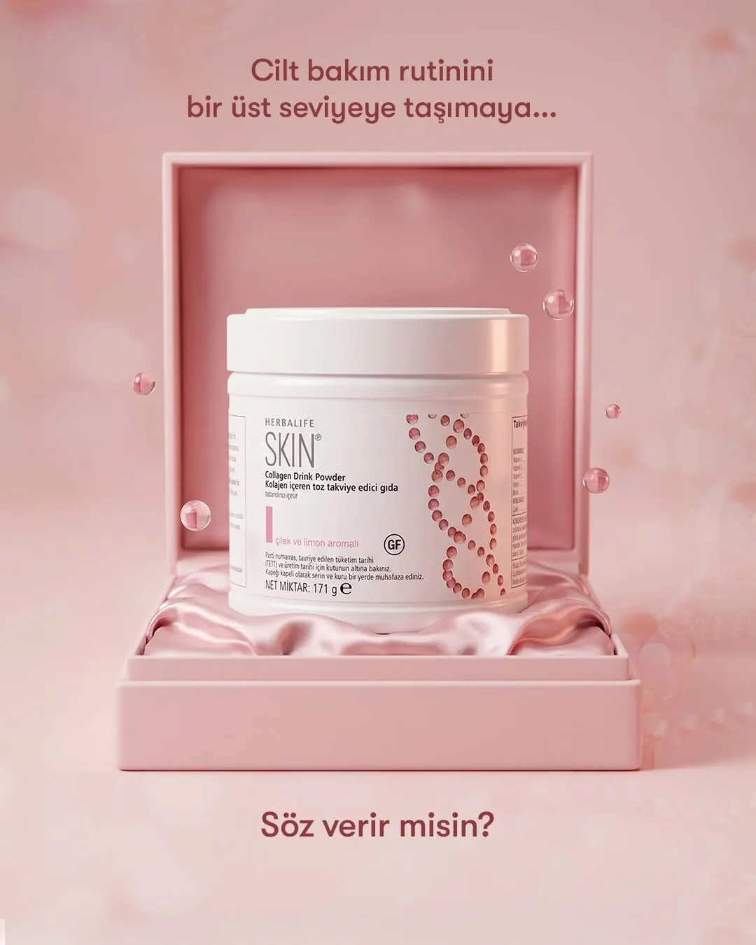 Herbalife SKIN Collagen Drink Powder Çilek ve Limon Aromalı Kolajen Takviyesi 171 g Pembe renkli lüks hediye kutusu içinde duran çilek ve limon aromalı Herbalife SKIN kolajen içeren toz takviye edici gıda