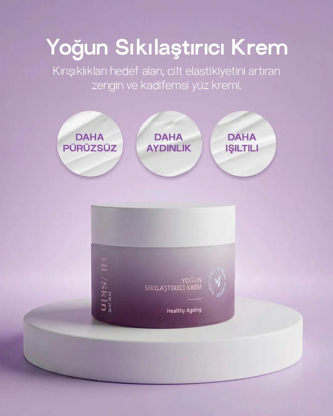 Herbalife HL Skin Yoğun Sıkılaştırıcı Krem Healthy Ageing Yüz Kremi Beyaz silindirik podyum üzerinde duran mor ambalajlı Herbalife HL Skin yoğun sıkılaştırıcı yüz kremi